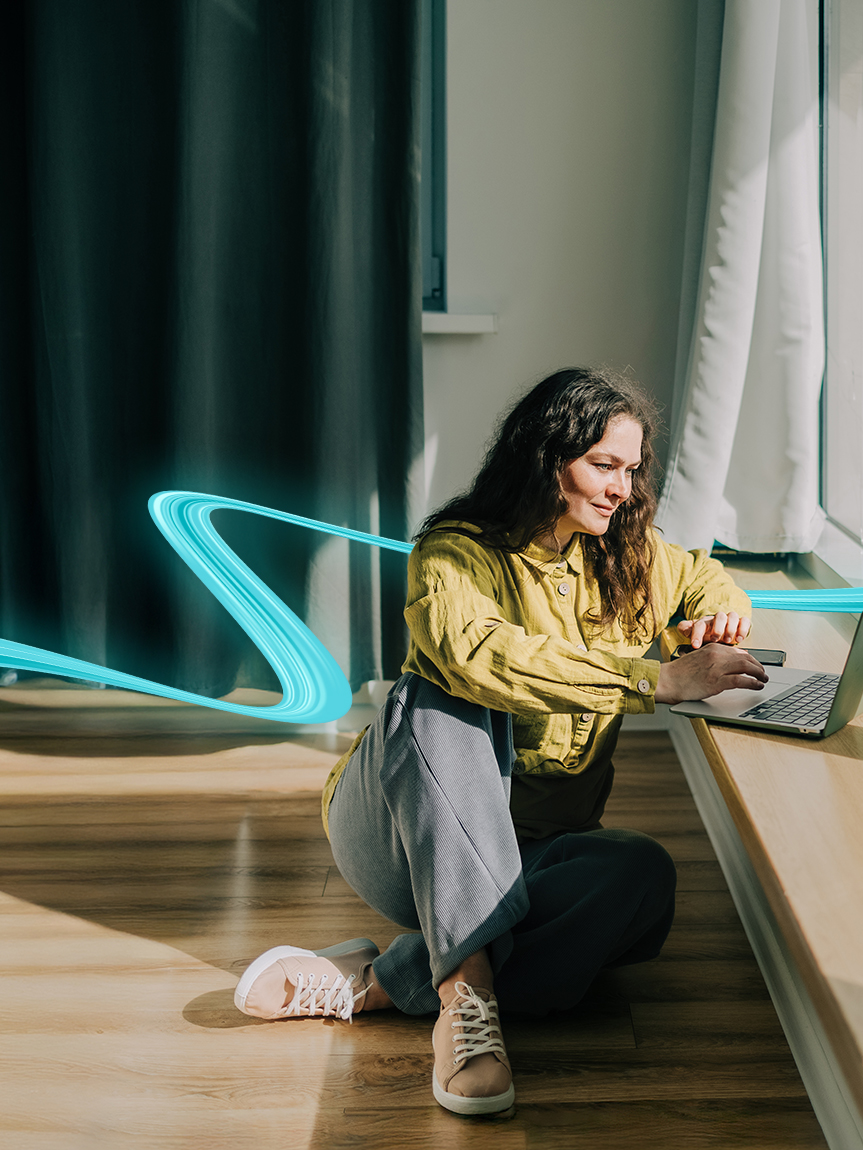 woman sitting on hardwood floor